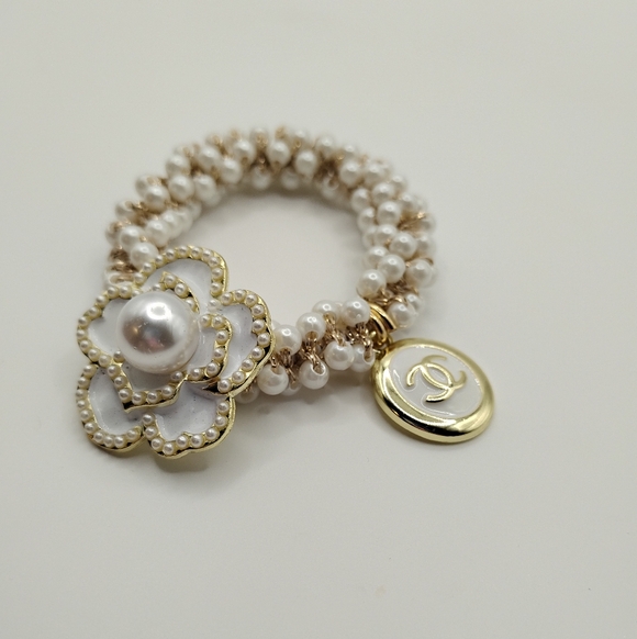 CHANEL Accessories - CHANEL Gold and White Pearl Camellia Charm Bracelet Comes With It's Box